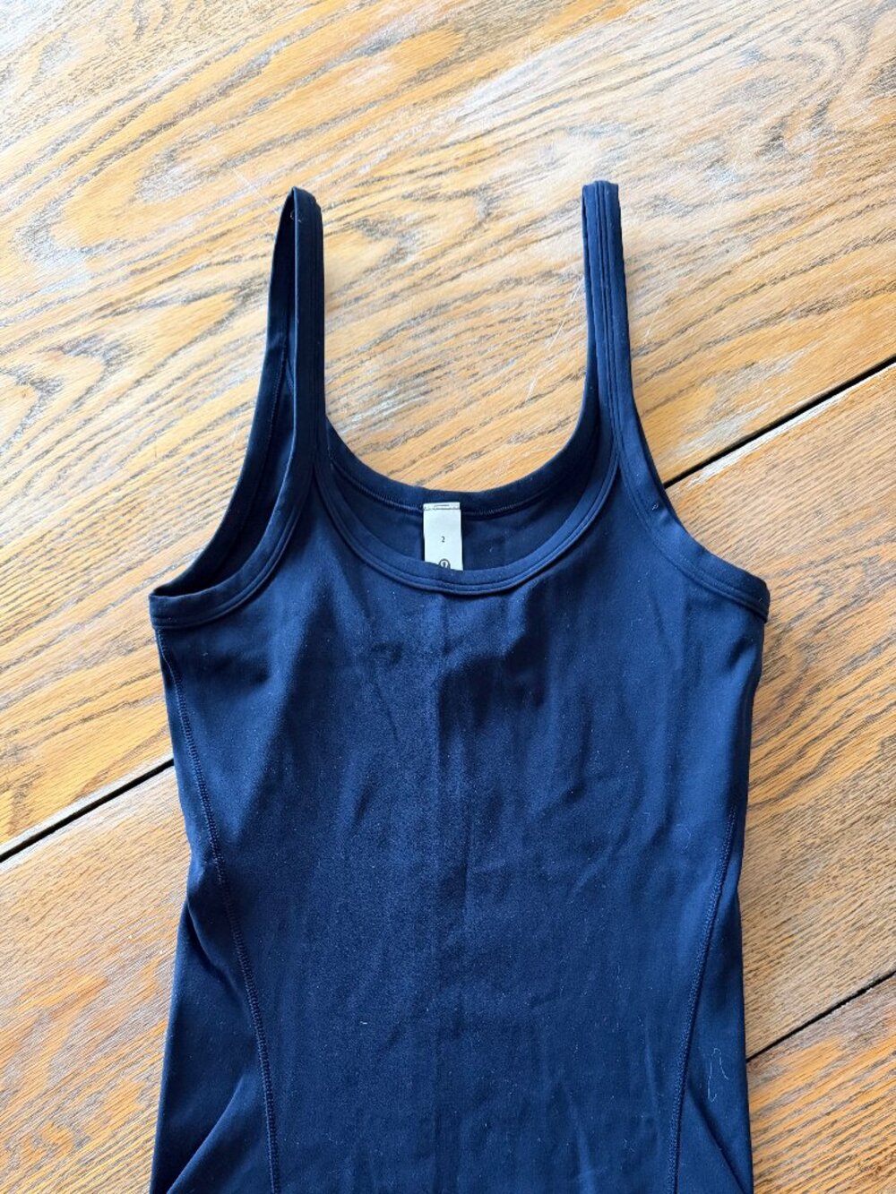 LULULEMON ATHLETICA dk blue tank top/never worn/size 2